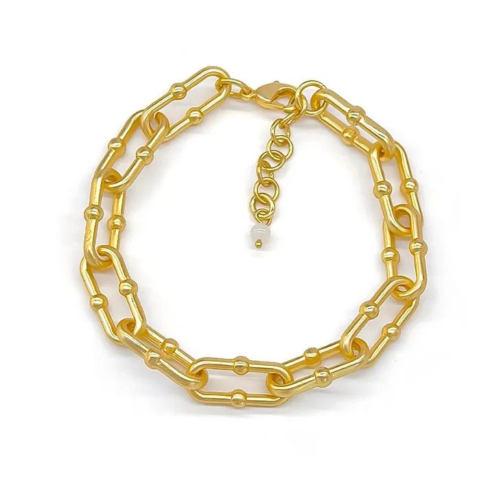 Золотий браслет-скріпка